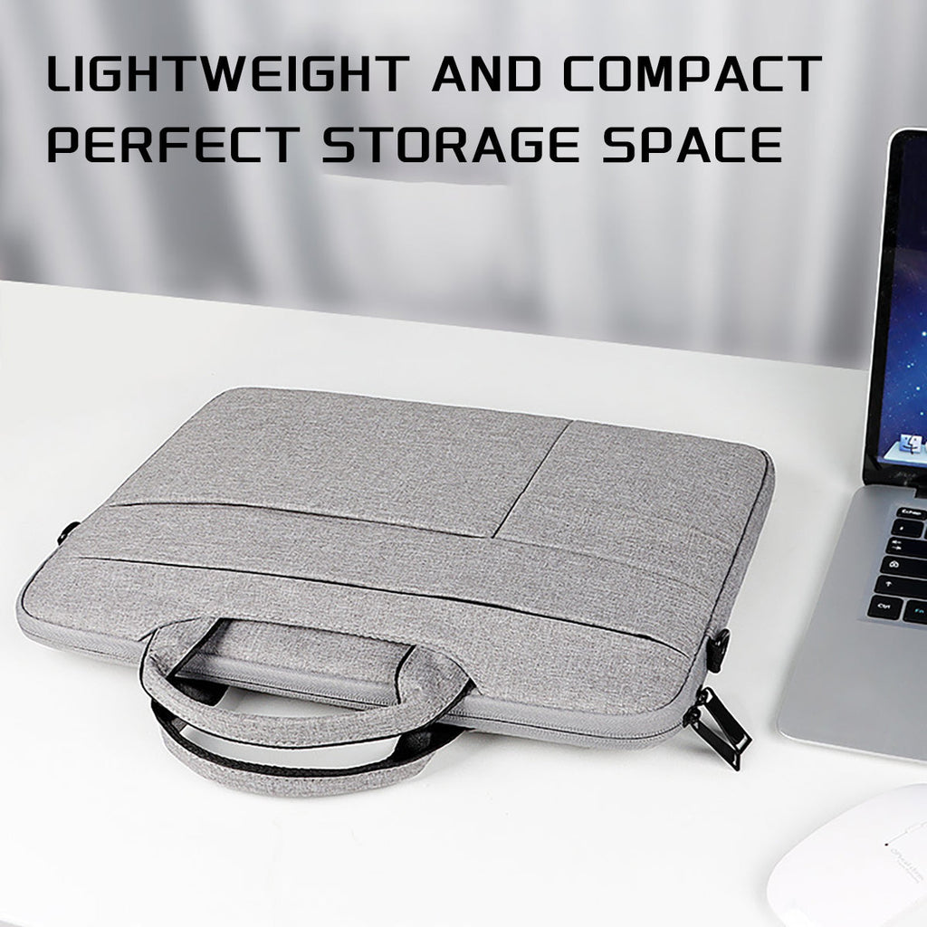 Light gray laptop bag with top handle, detachable shoulder strap, zippered main compartment