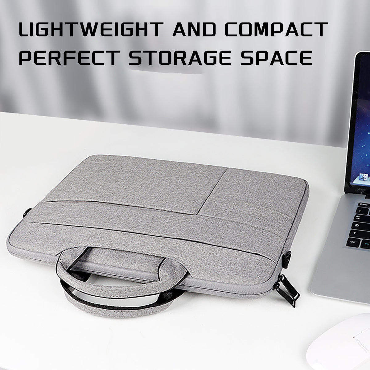 Light gray laptop bag with top handle, detachable shoulder strap, zippered main compartment
