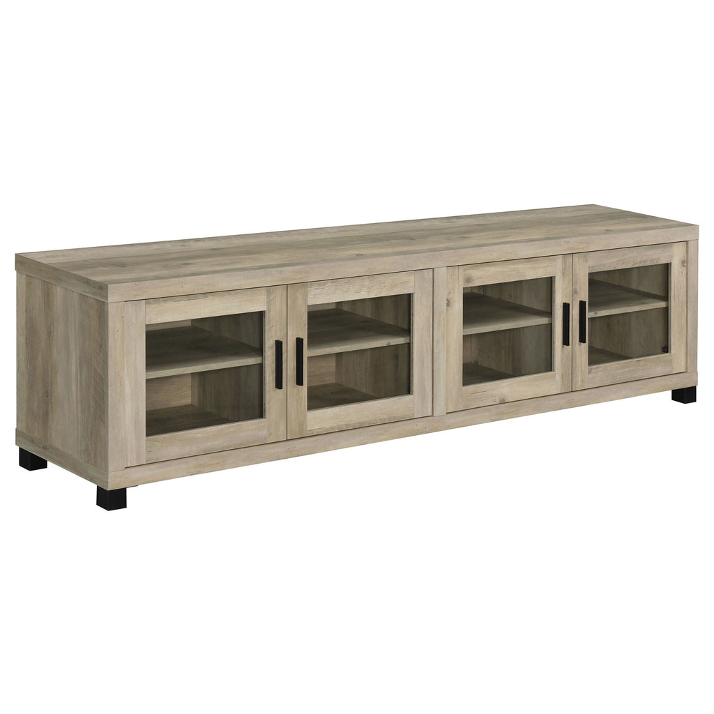 Distressed pine TV stand with four cabinet doors and open shelving, black feet