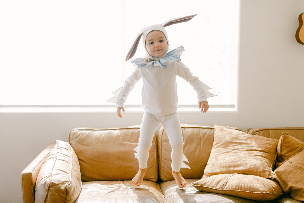 White bunny costume set with blue star collar and tall bunny-ear hood