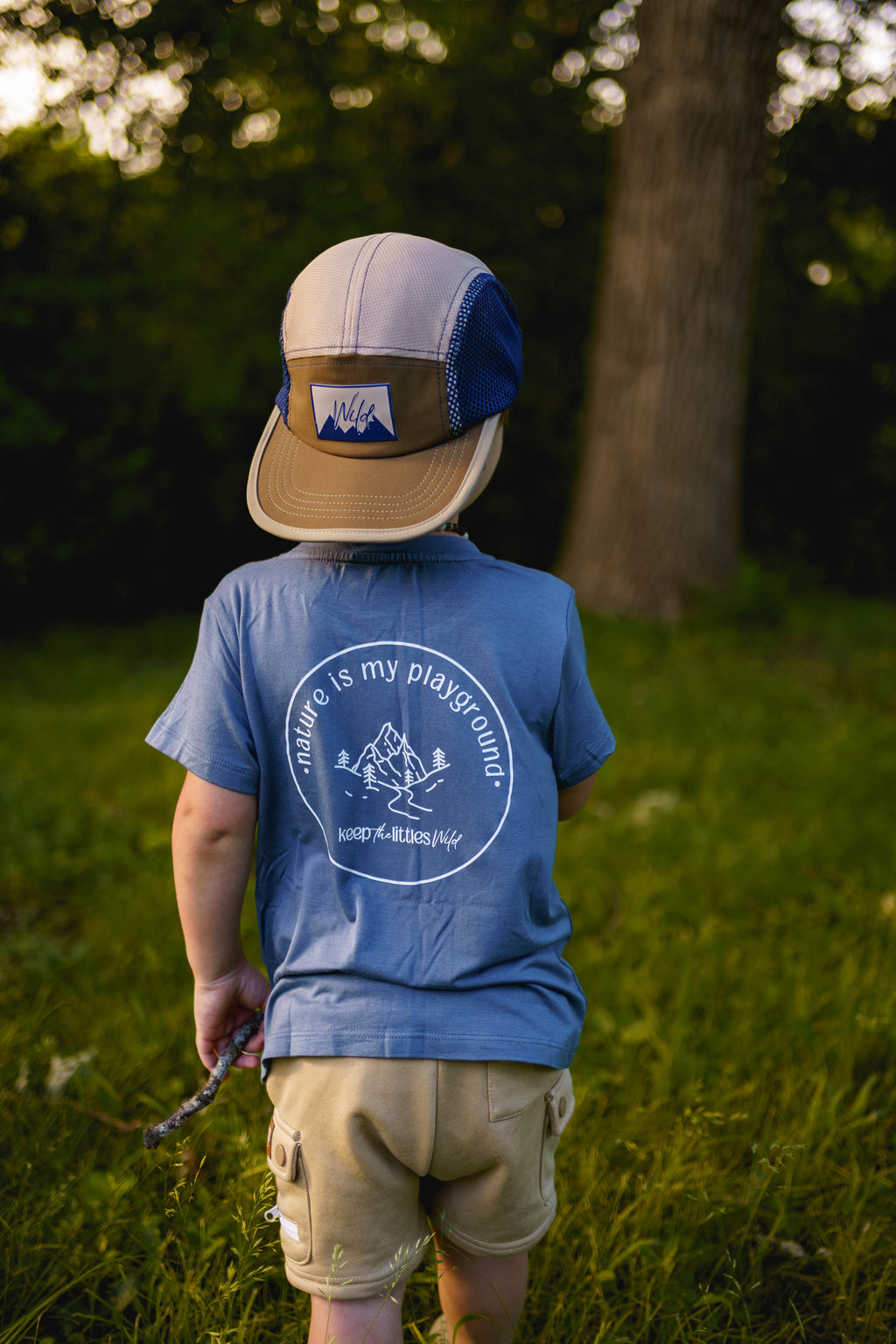 Kids blue bamboo T-shirt with circular nature graphic and slogan on back