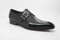 Black monk strap leather dress shoe with buckle strap and low block heel