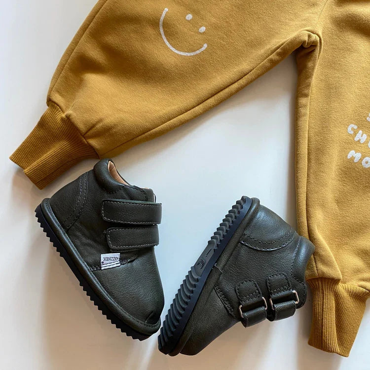 Toddler barefoot sneakers in dark green, side-by-side with hook-and-loop straps.