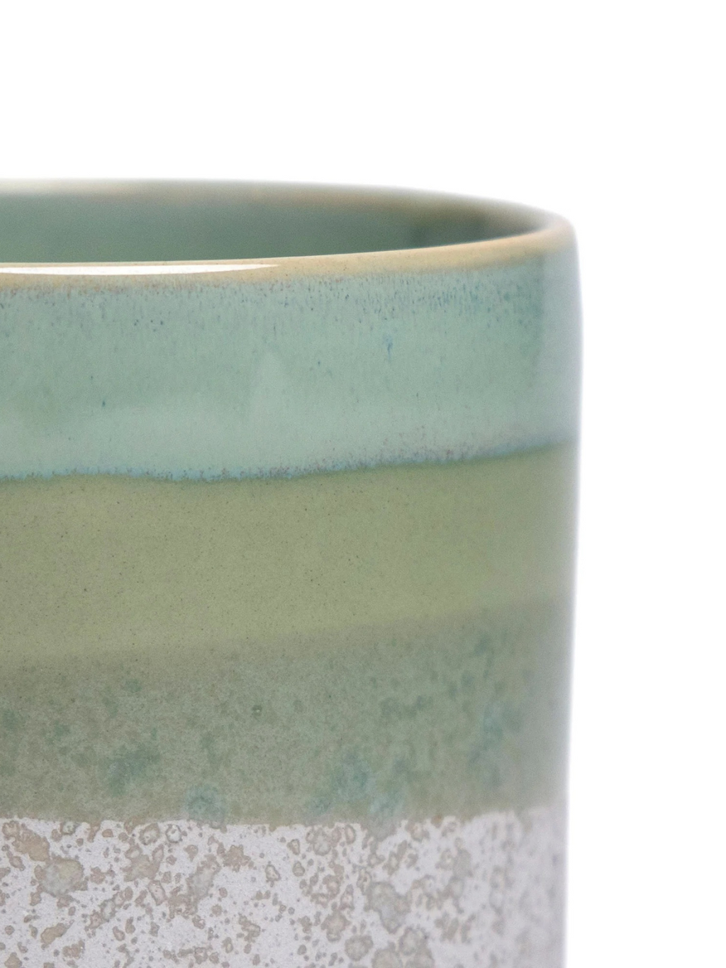 Cement green ceramic pot interior rim and upper glaze band close-up