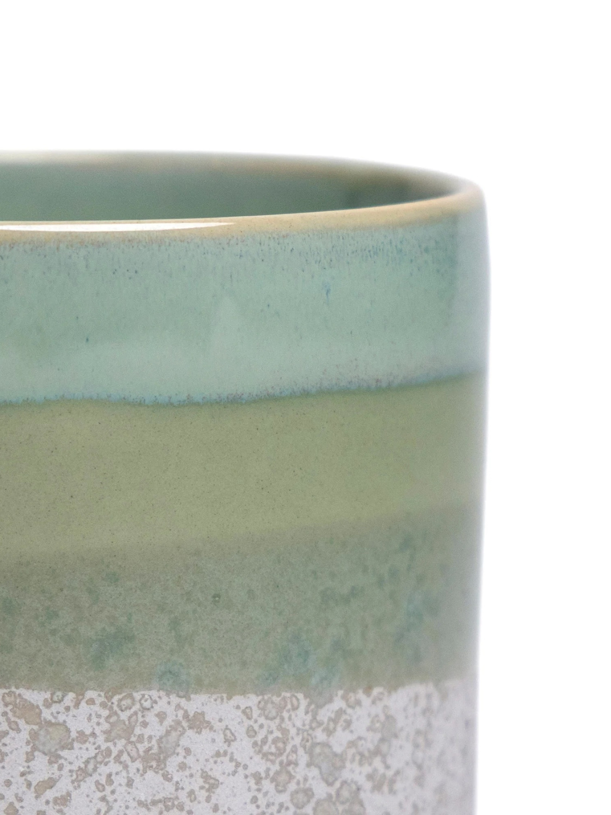 Cement green ceramic pot interior rim and upper glaze band close-up