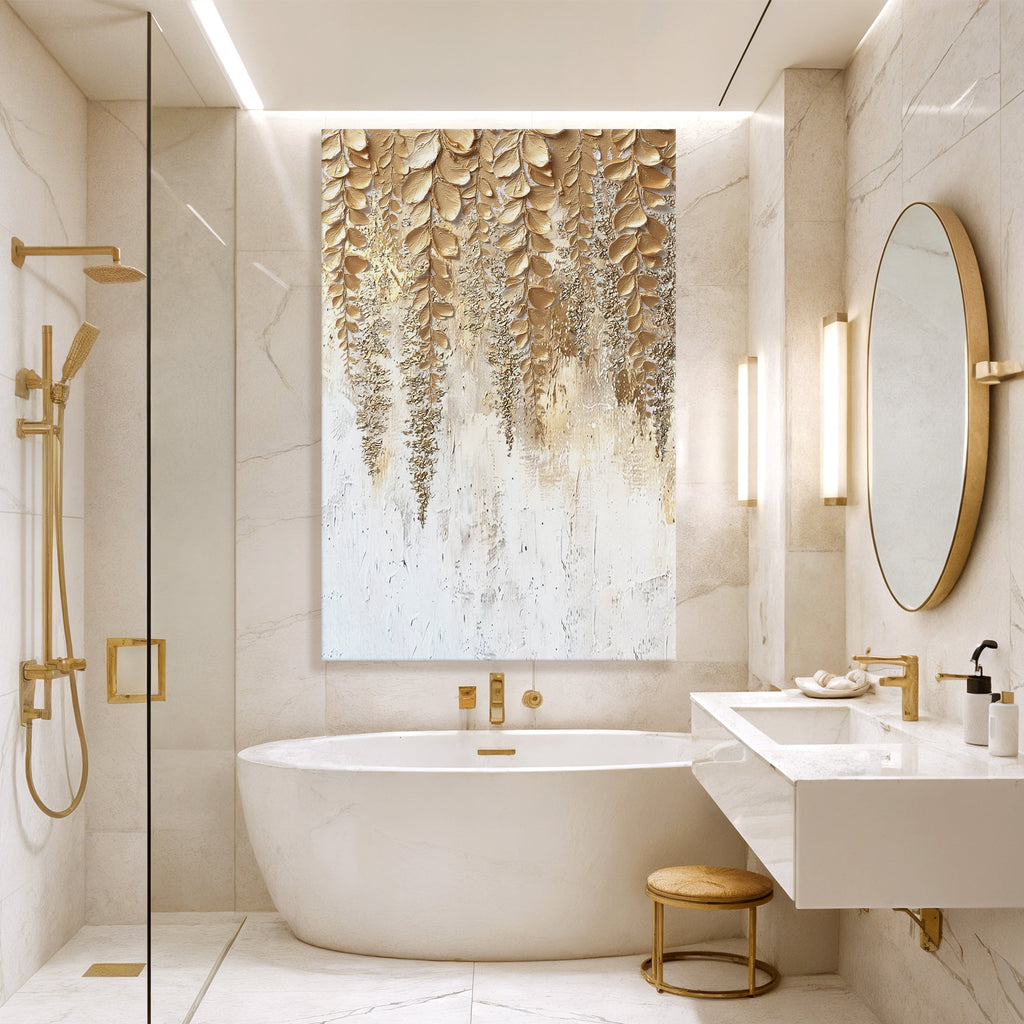 Gold botanical wall art canvas with raised leaf design over distressed white paint
