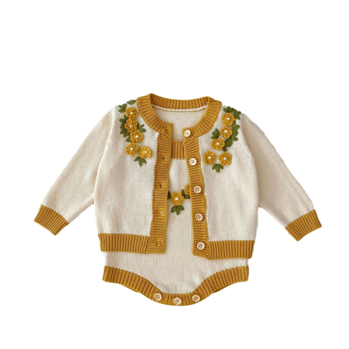 Cream knitted baby coat with mustard button front and floral wreath appliques