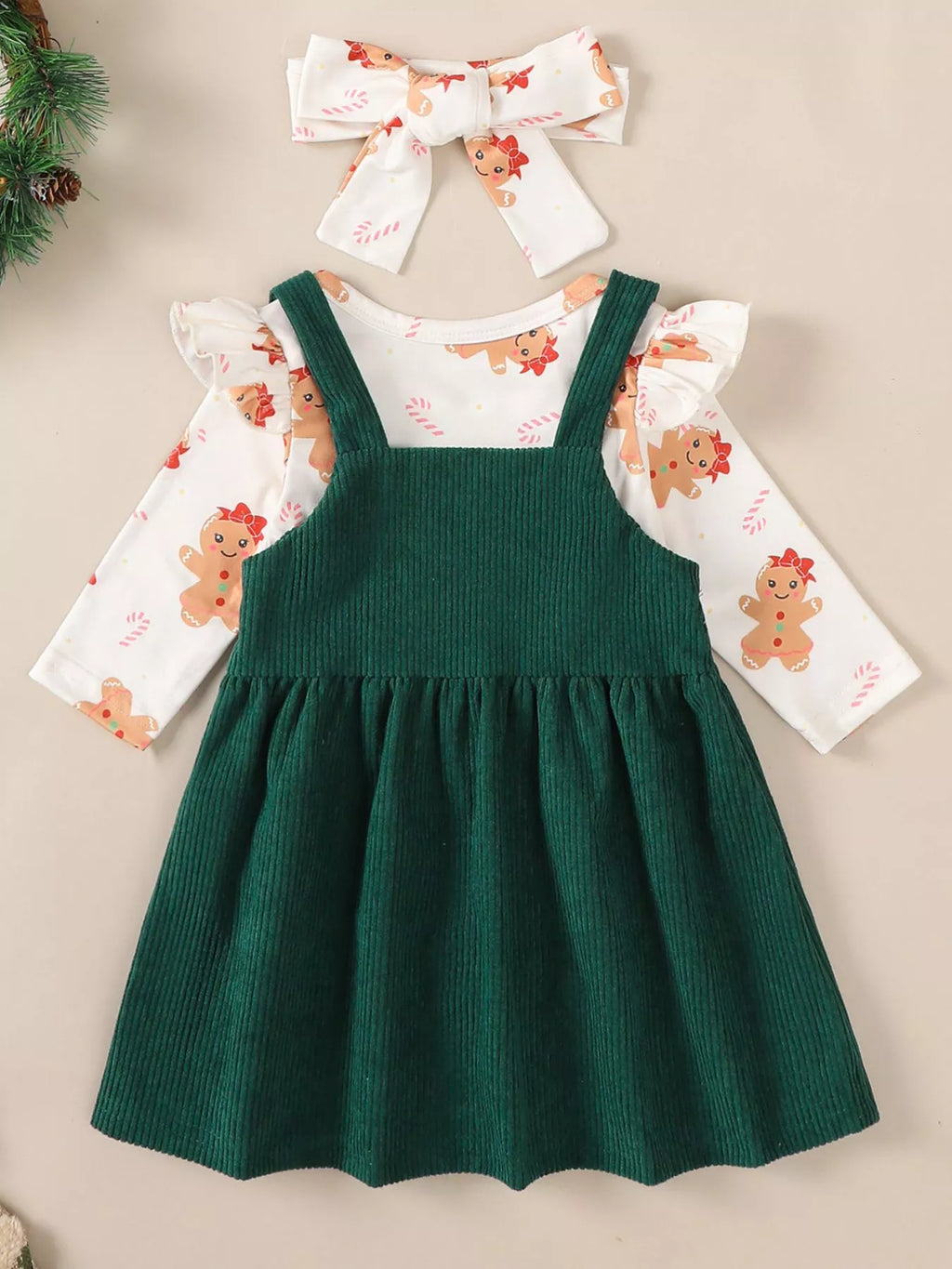 Green corduroy overall dress with reindeer applique over gingerbread print long-sleeve bodysuit