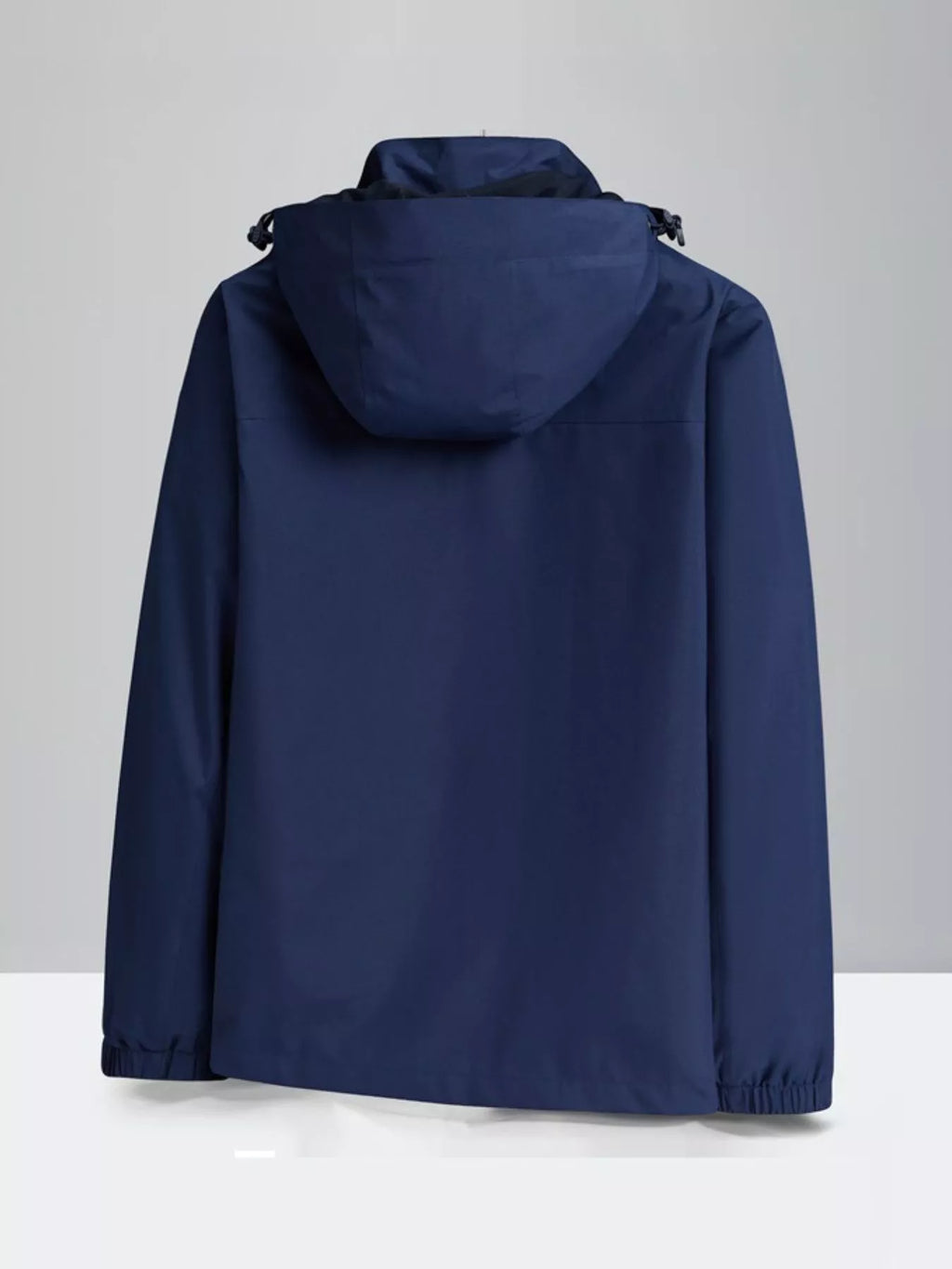 Navy zip-up hooded waterproof jacket, back view