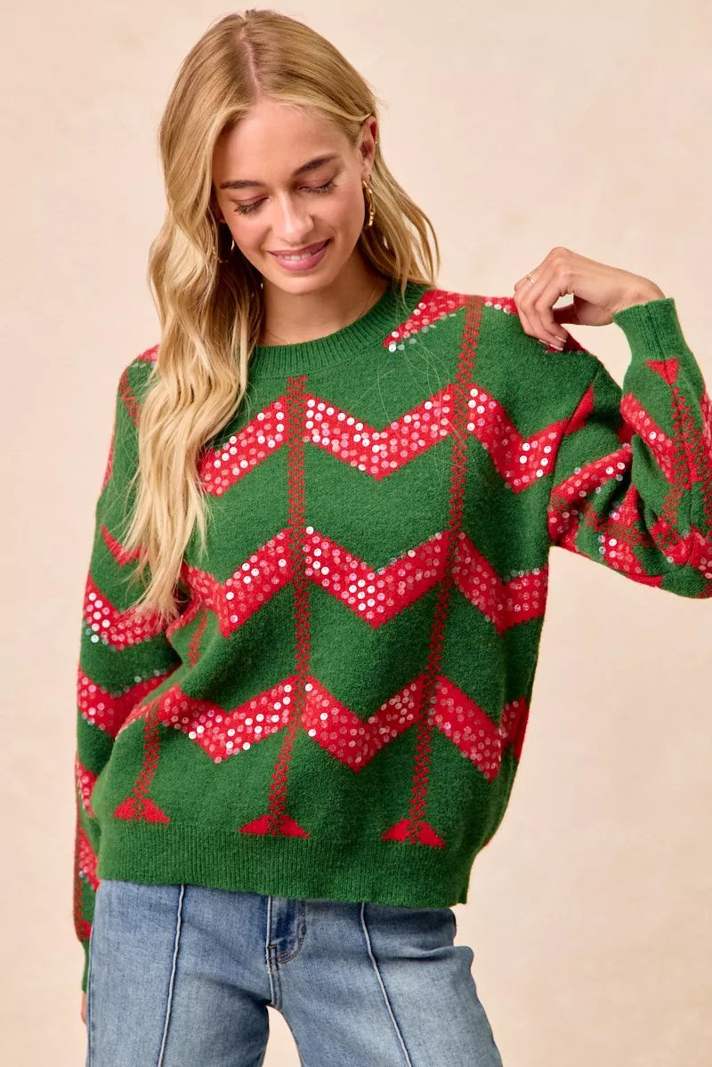 Green chevron knit sweater with red sequin zigzag pattern and long sleeves
