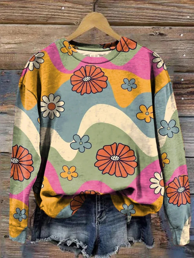 Women's round-neck sweater with bold multicolor flower print, long sleeves