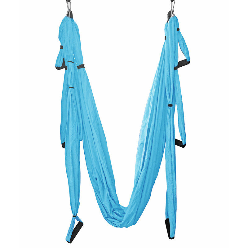Blue aerial yoga hammock swing with hanging loops and end foot straps