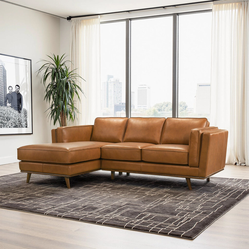 Light brown sectional sofa with chaise and back cushions