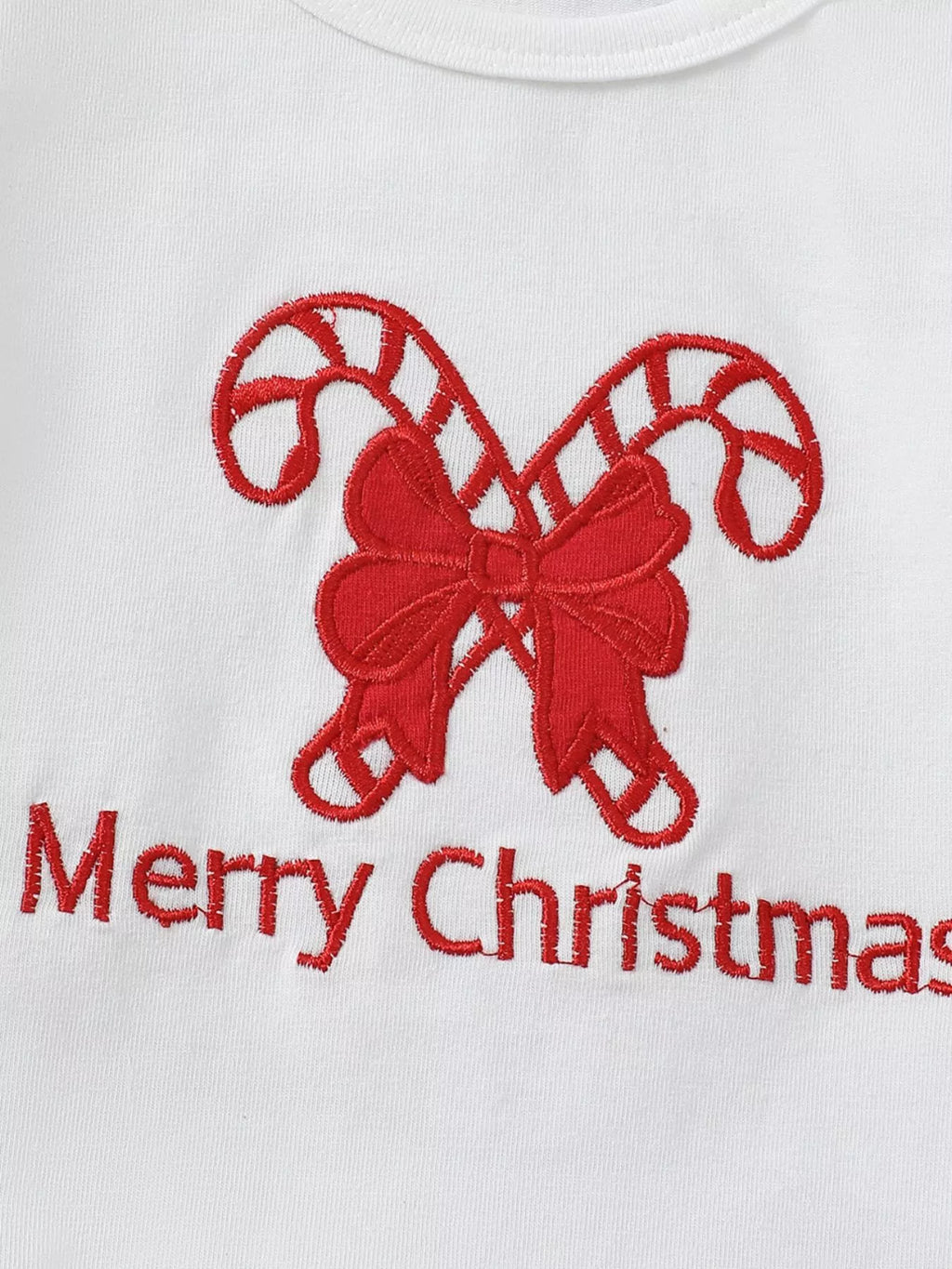 White Christmas top with red bow embroidery and 'Merry Christmas' text