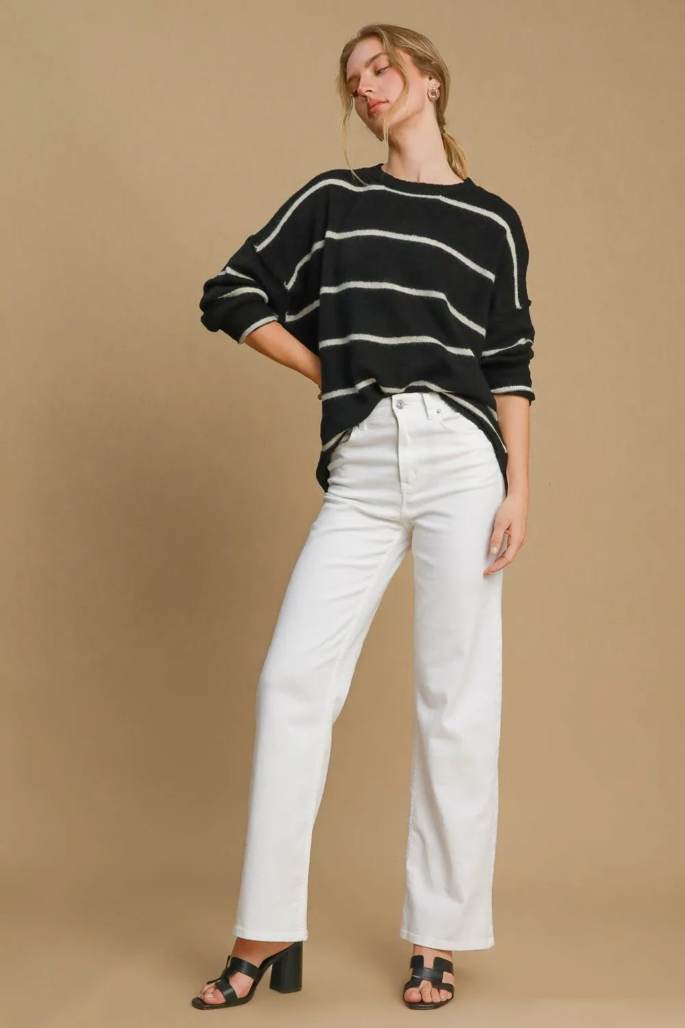 Black and cream striped round-neck wool-blend sweater with loose, slightly cropped sleeves