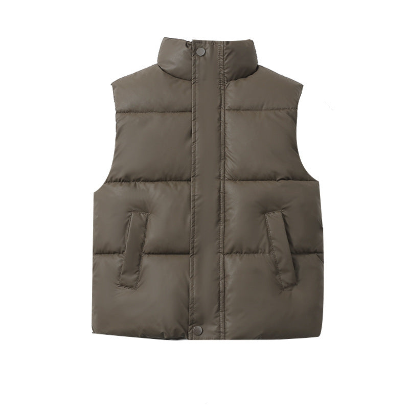 Children’s padded puffer vest coat in cement gray, zip-front with stand collar and pockets
