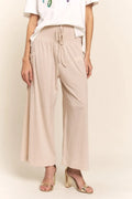 Light beige smocked-waist boho wide-leg pants with side pockets