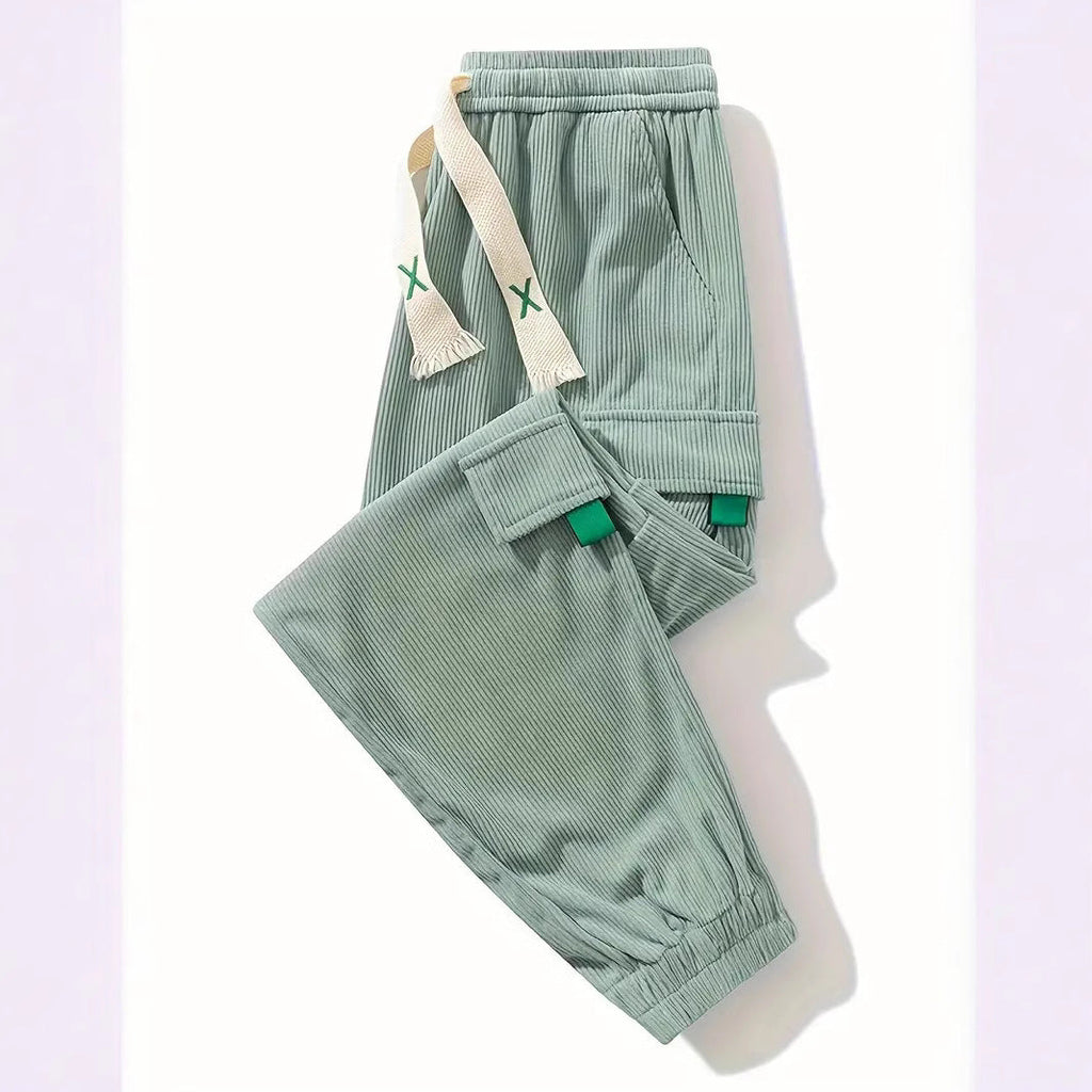 Light green corduroy pants with elastic waistband and side cargo pockets