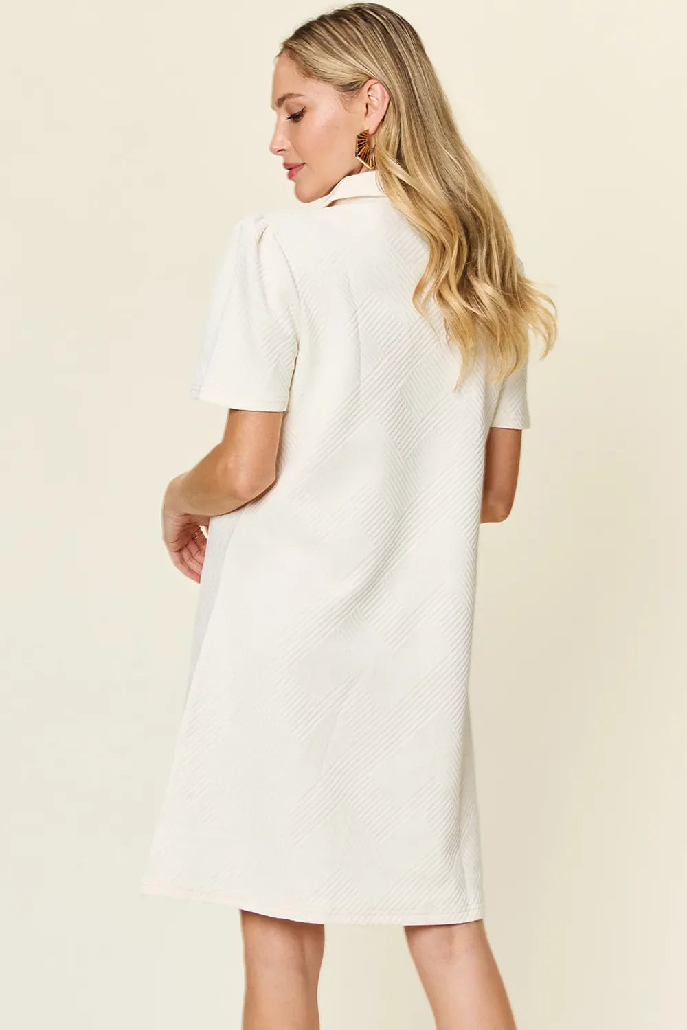 White textured collared short-sleeve shift dress, back view