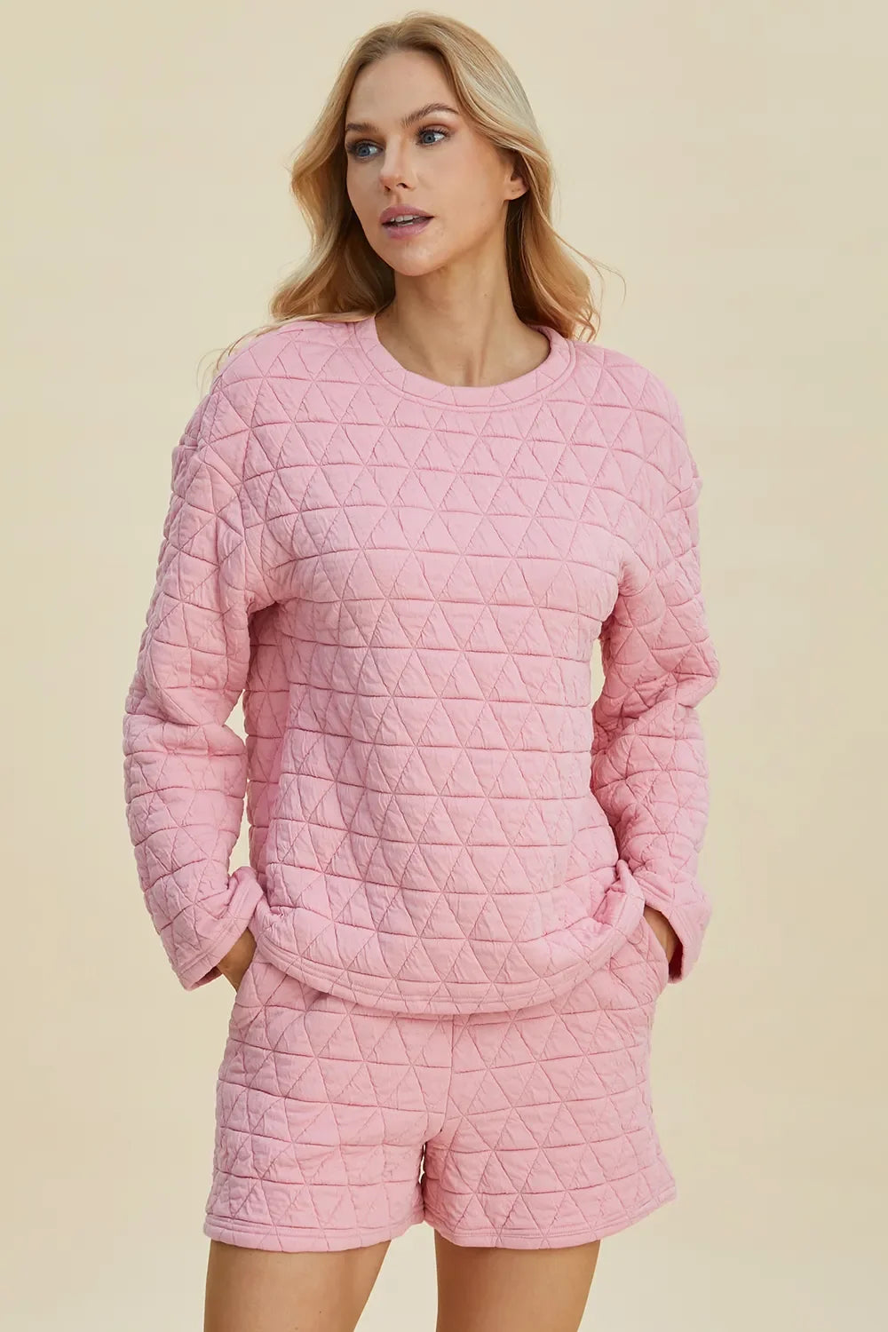 Pink textured long-sleeve top and matching shorts set