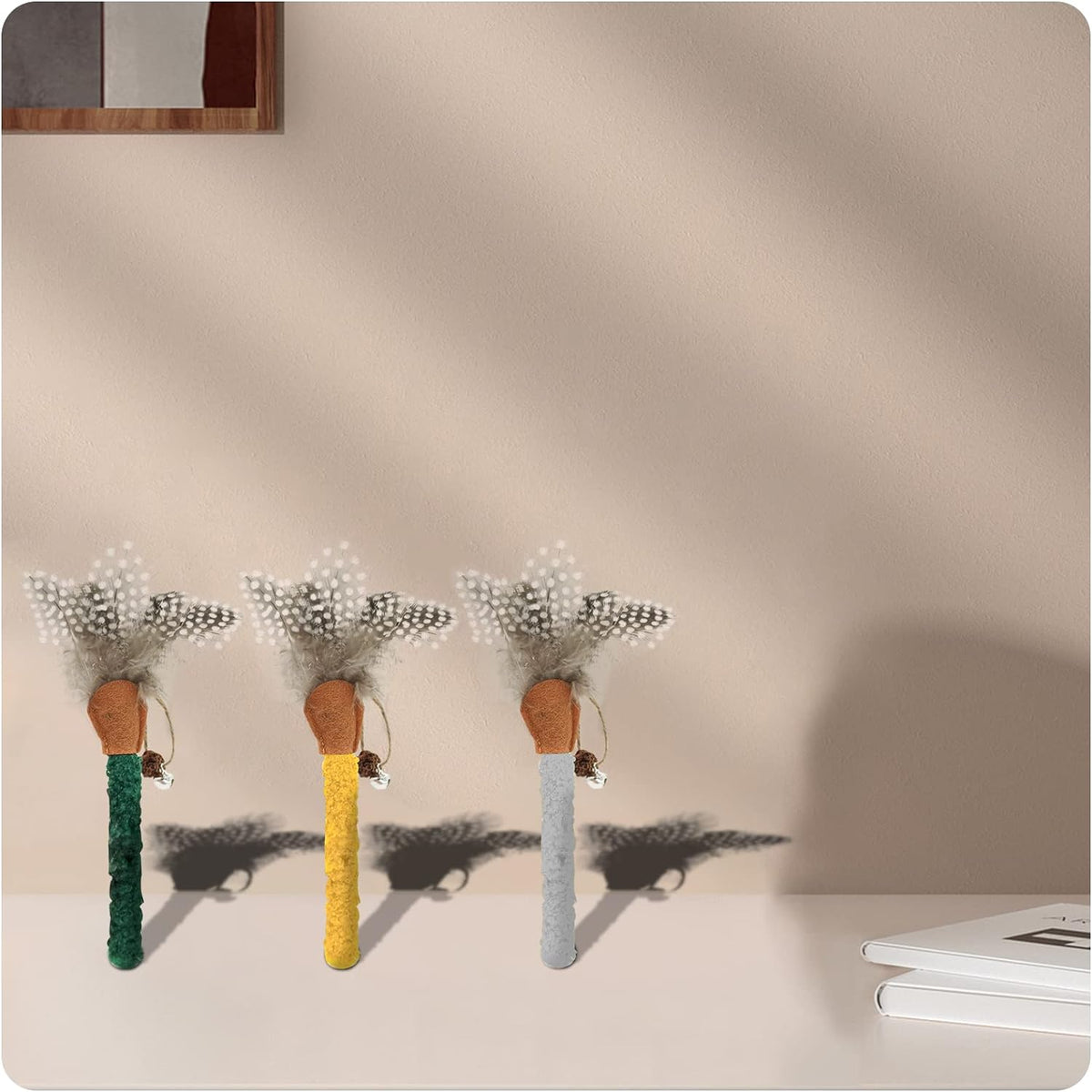 Cat chew stick toy set with green, yellow, and gray textured wands and feather sprigs