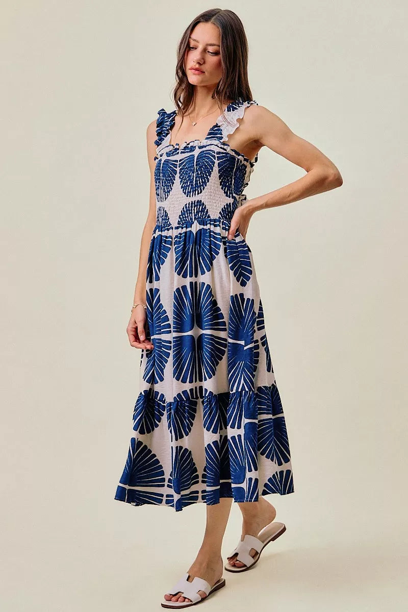 Navy and white abstract print sleeveless midi dress with tiered ruffle hem