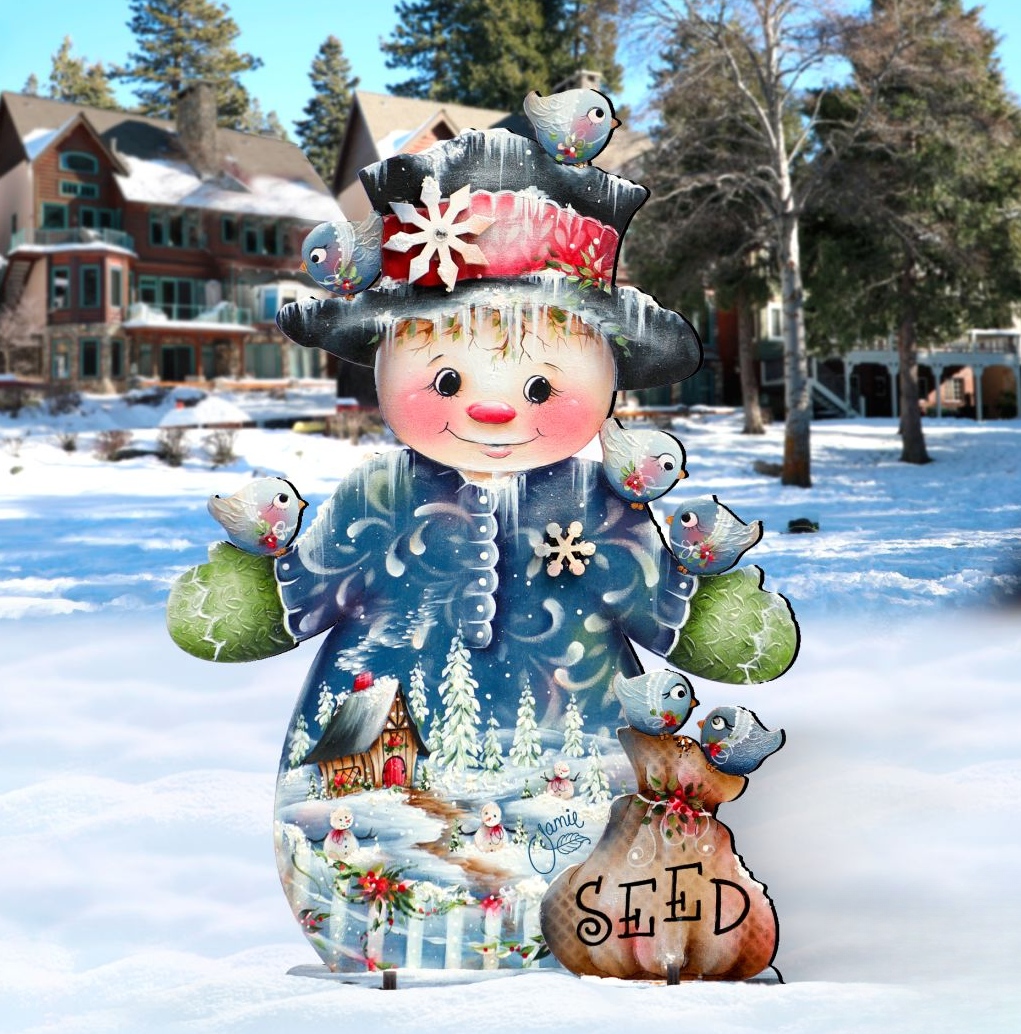 Freestanding Christmas yard sign of blue snowman with birds and 'SEED' basket