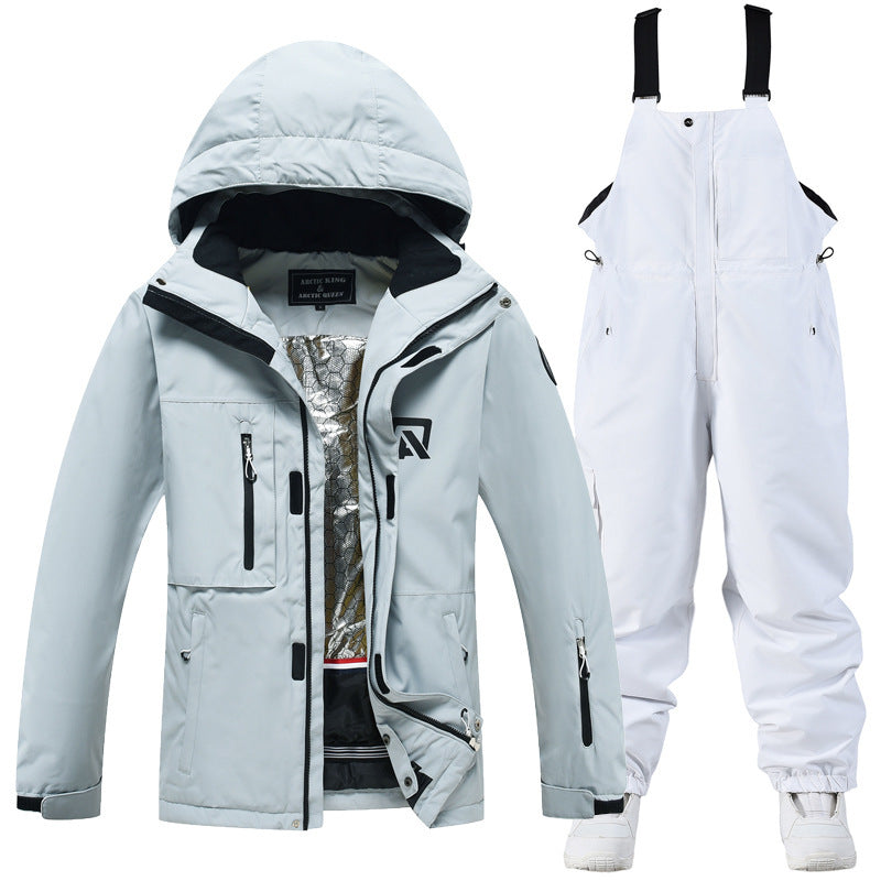 Light blue jacket with hood and white bib ski pants with adjustable straps
