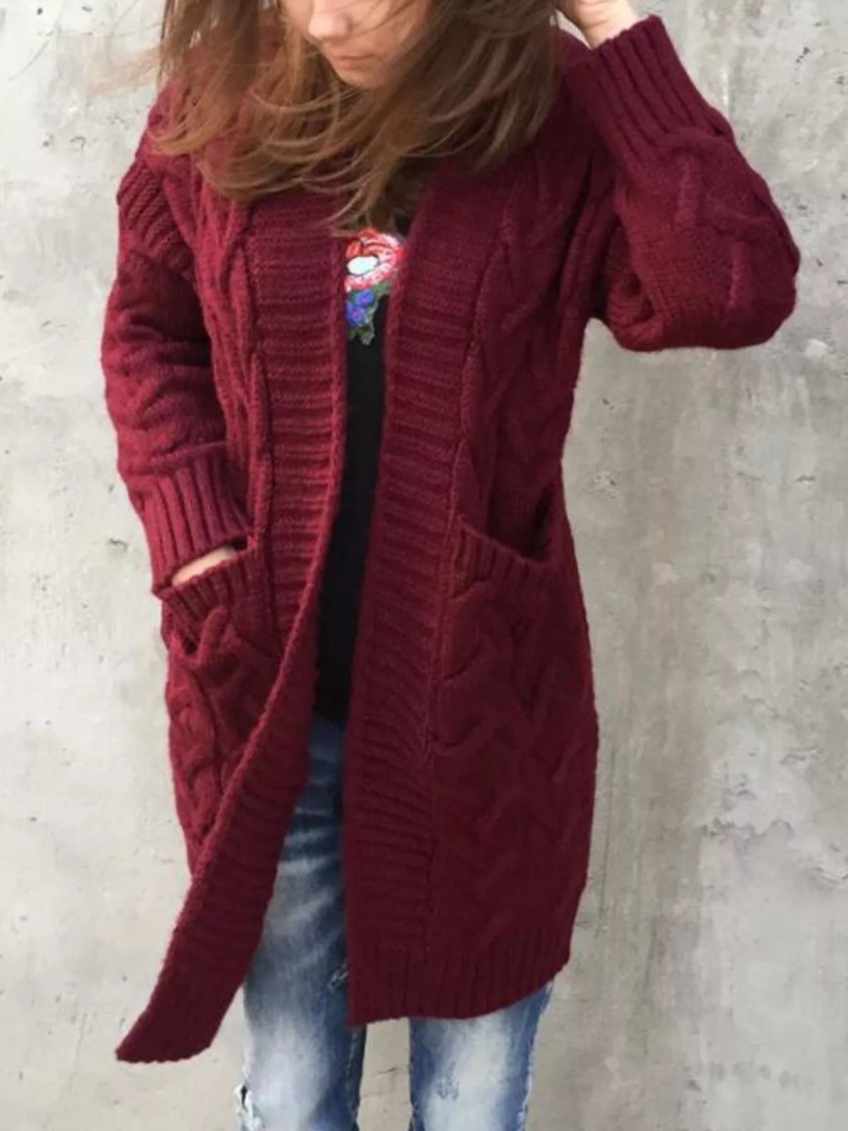 Burgundy long cardigan with open front and thick cable-knit design