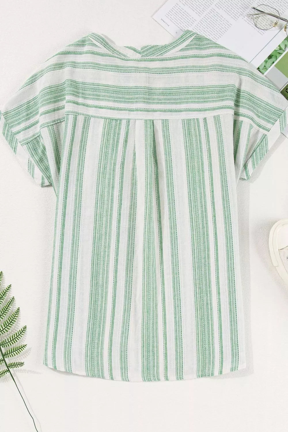 Light green striped gauze blouse, back view with short sleeves