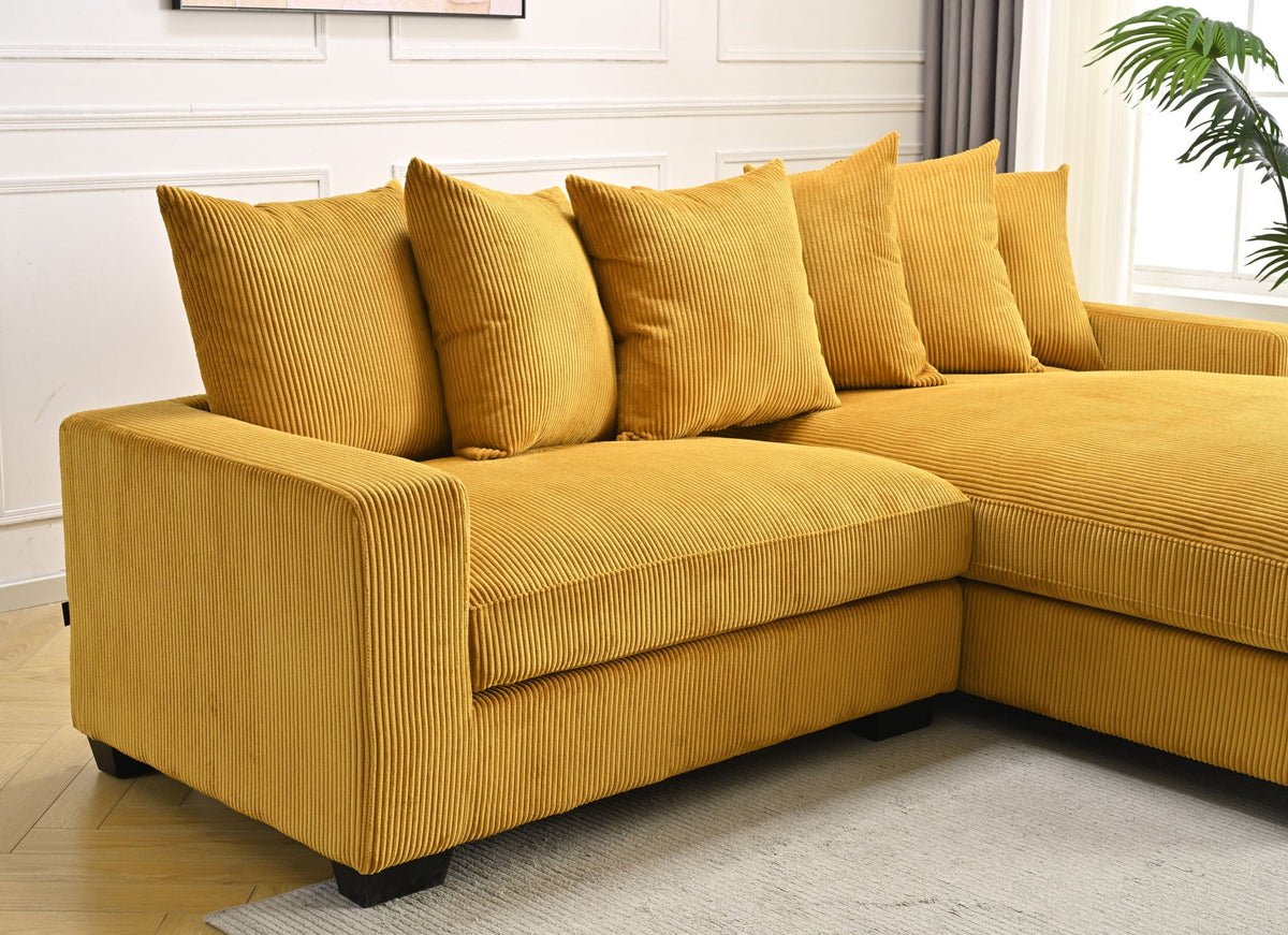 Oversized sectional sofa with chaise, mustard yellow corduroy and tufted cushions