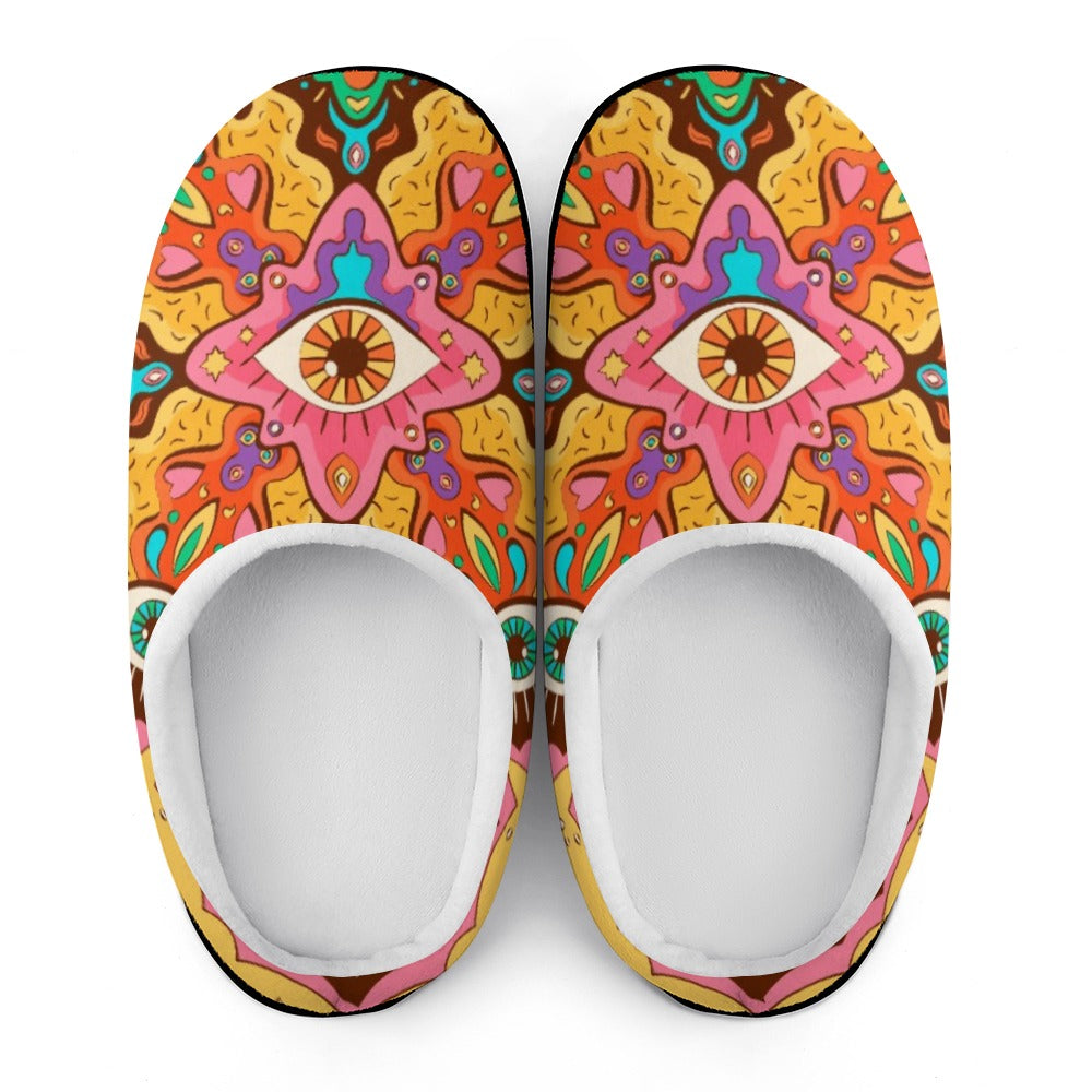 Top view of two cotton slippers with colorful graphic uppers and white interior footbeds
