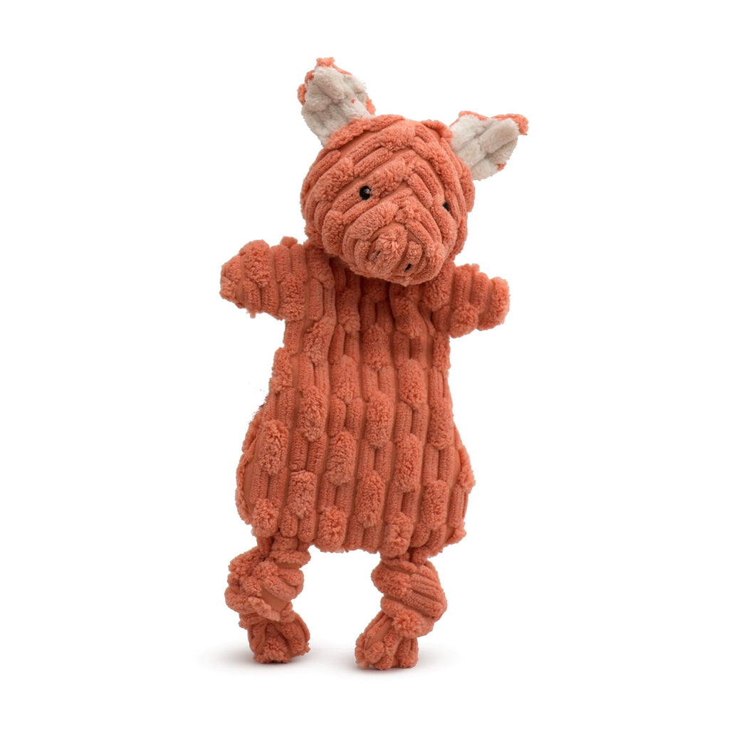 Rust orange plush dog toy with pig-like face and textured body