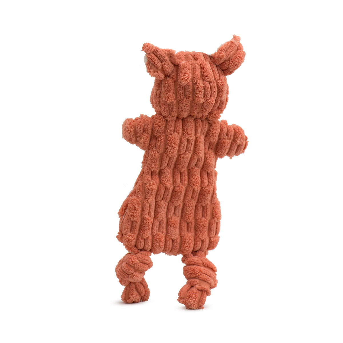 Rust orange plush dog toy from side view with textured sweater look