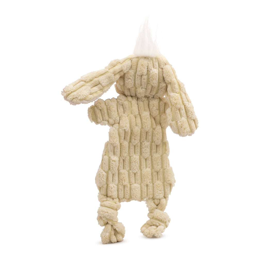 Cream plush dog toy from back view with ridged pattern and long ears