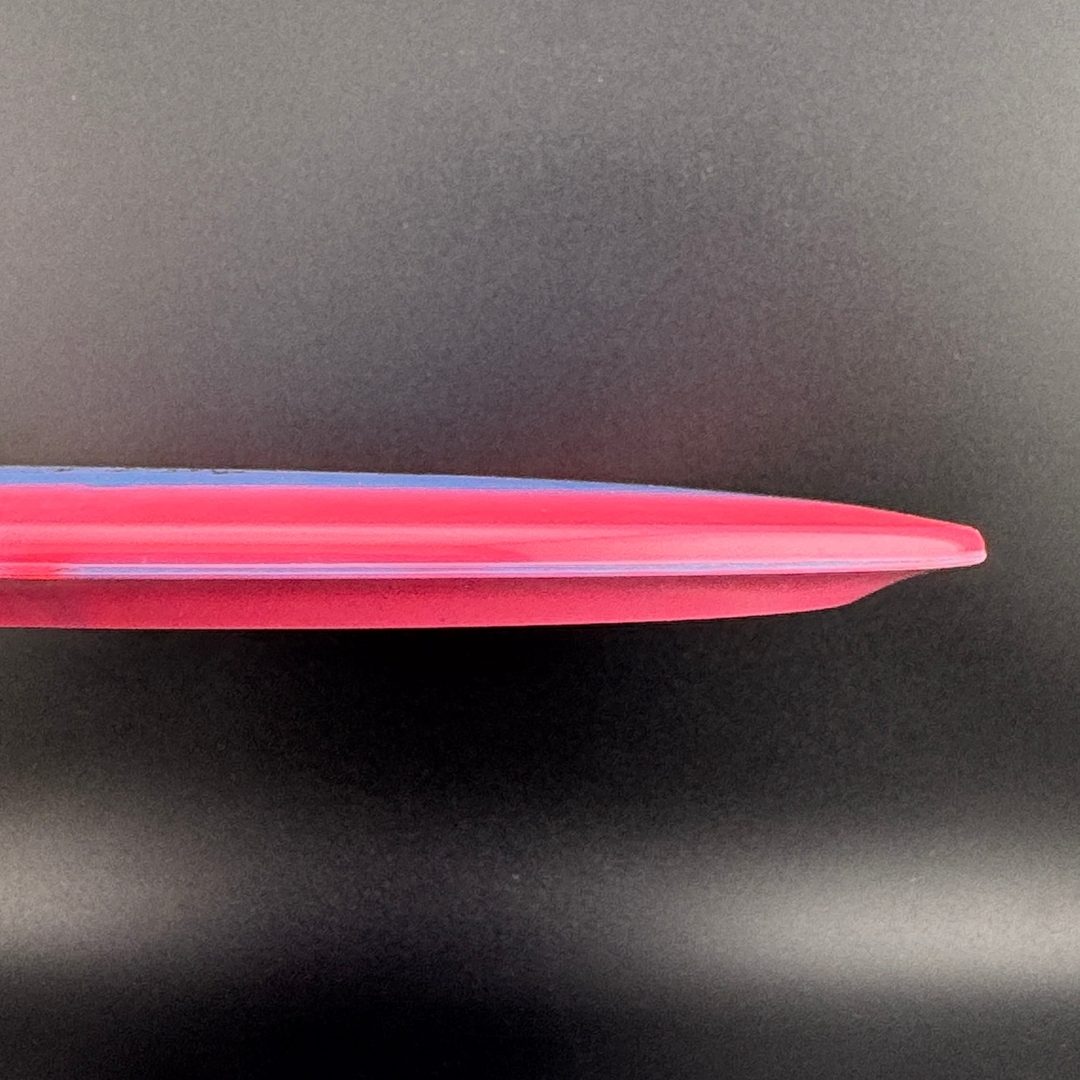 Pink disc golf driver side profile