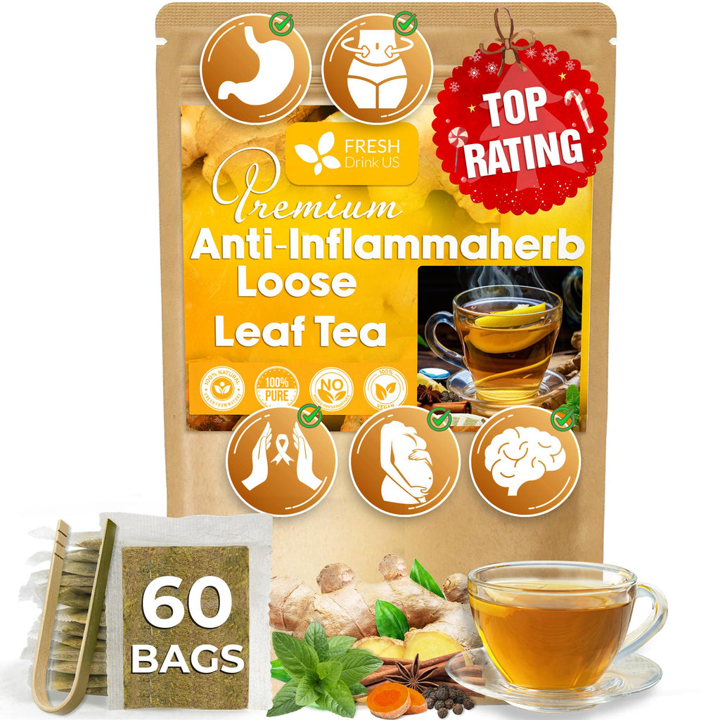 Loose leaf tea pouch with cup and ginger, turmeric, mint, pepper, cinnamon on display