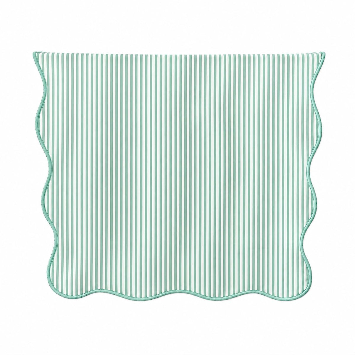 Sage green and white striped table runner with scalloped edges, lined