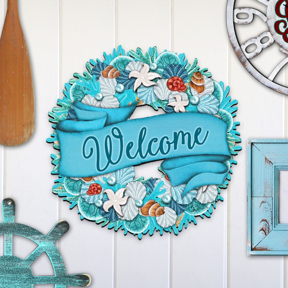 Coastal welcome door wreath with blue ribbon and seashell, starfish, and pearl accents