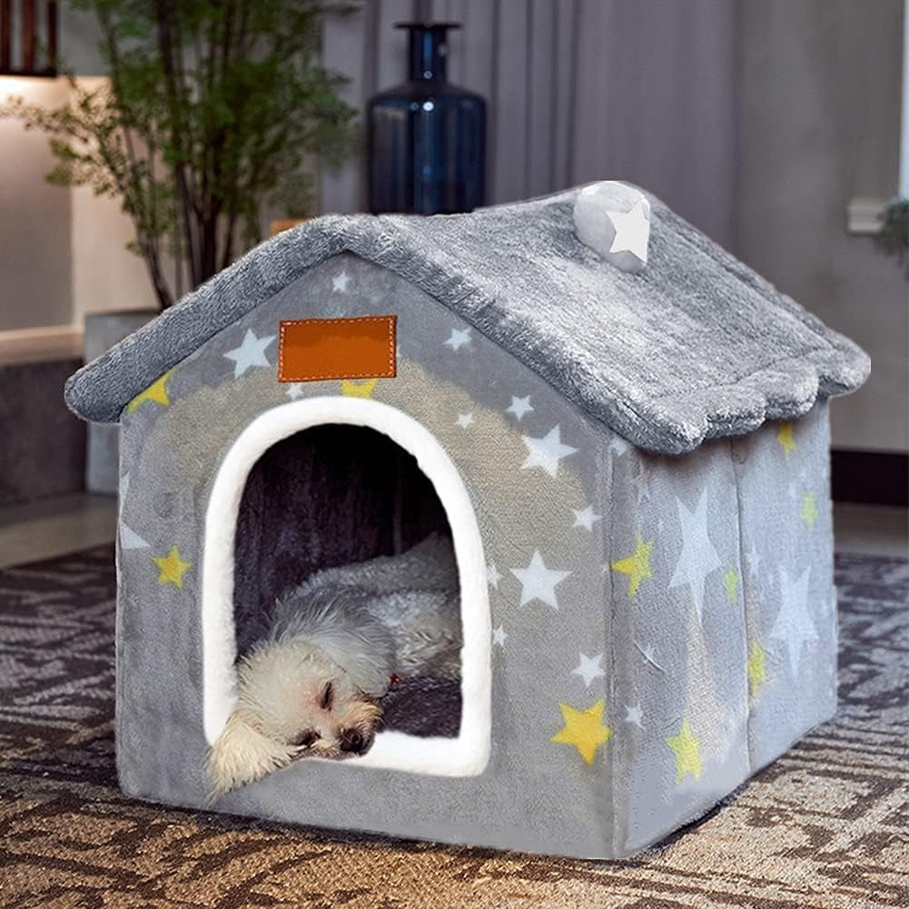 Gray indoor dog house bed with star pattern, padded roof, and white arched entrance.