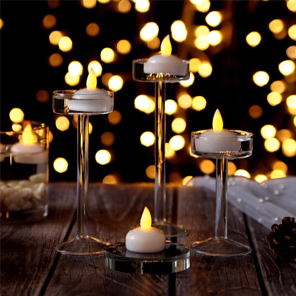 LED floating tea lights with warm yellow flame in clear holders, flameless set