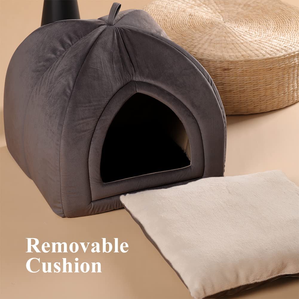 Dark gray cat tent bed with arched entrance and cushion removed, lying nearby