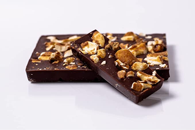 Dark chocolate bark squares with coconut caramel swirls and crushed cashews