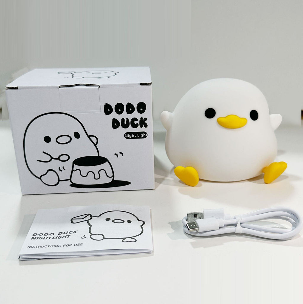 Duck silicone night light bundle with box, instruction paper, and USB charging cable