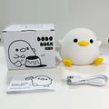 Duck silicone night light bundle with box, instruction paper, and USB charging cable