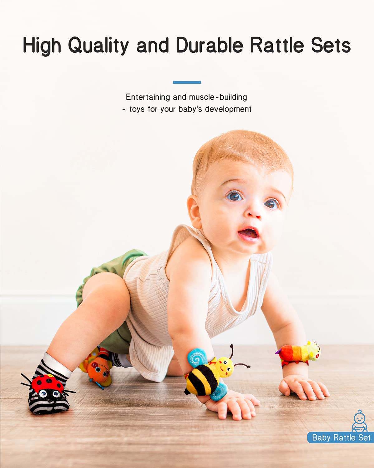 Baby crawling wearing striped bug rattle socks and a bee wrist rattle