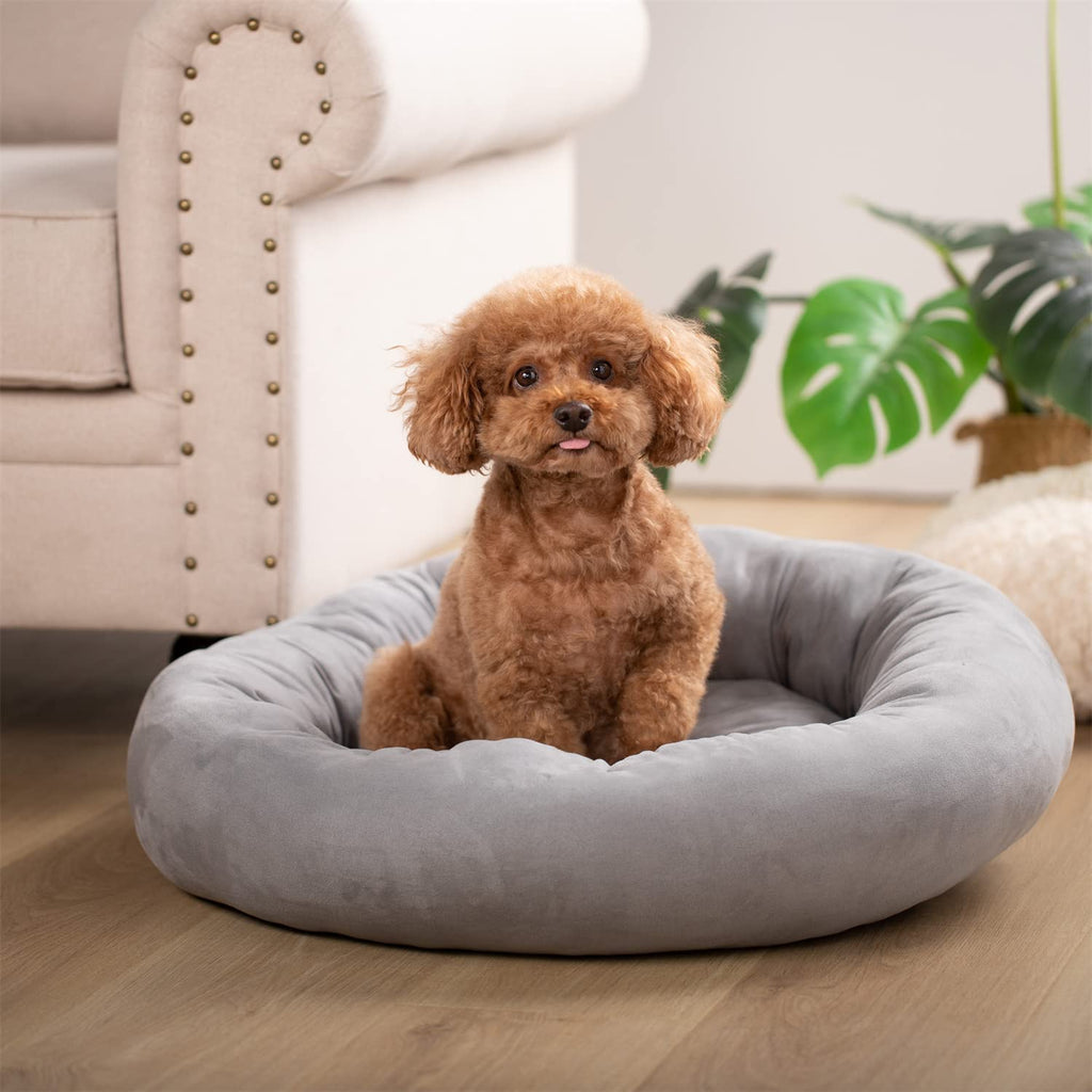 Round plush dog bed cushion in brown, with tufted rim and cushioned center.