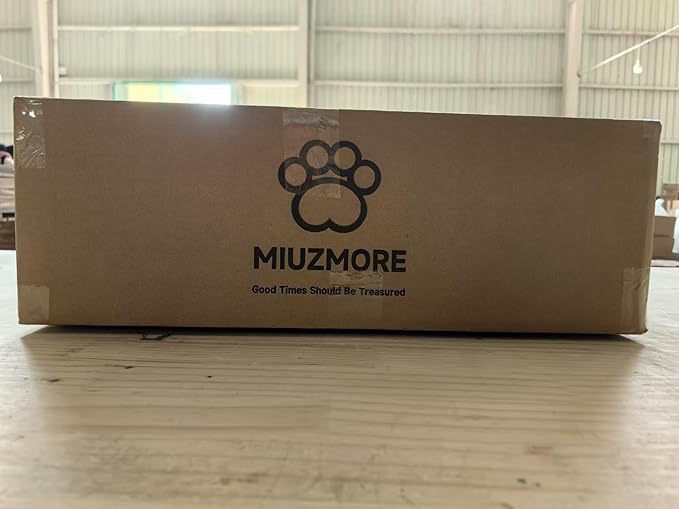 Cardboard shipping box with paw print logo and MiuZMORE branding
