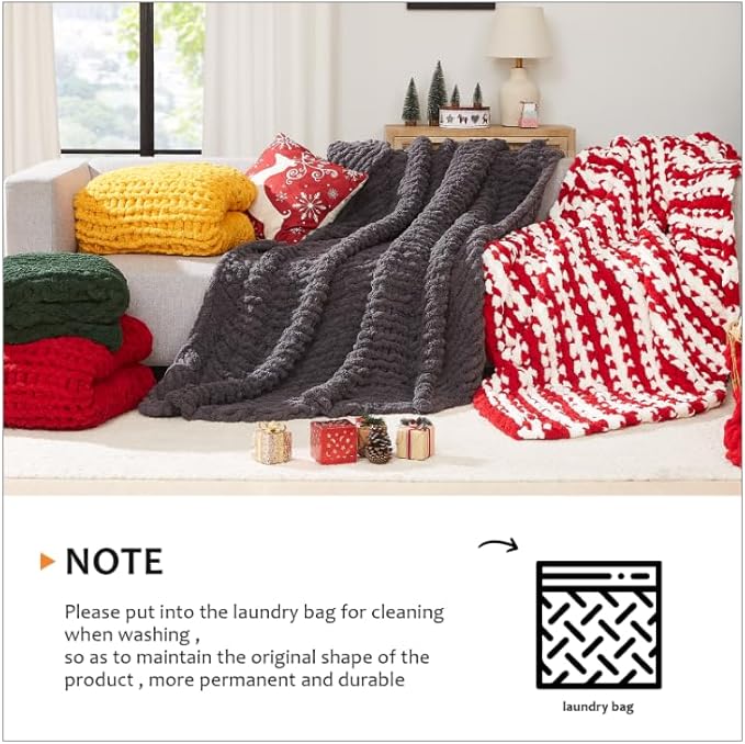 Chunky knit throw blankets in gray, red, dark gray, and red-white patterns on a sofa