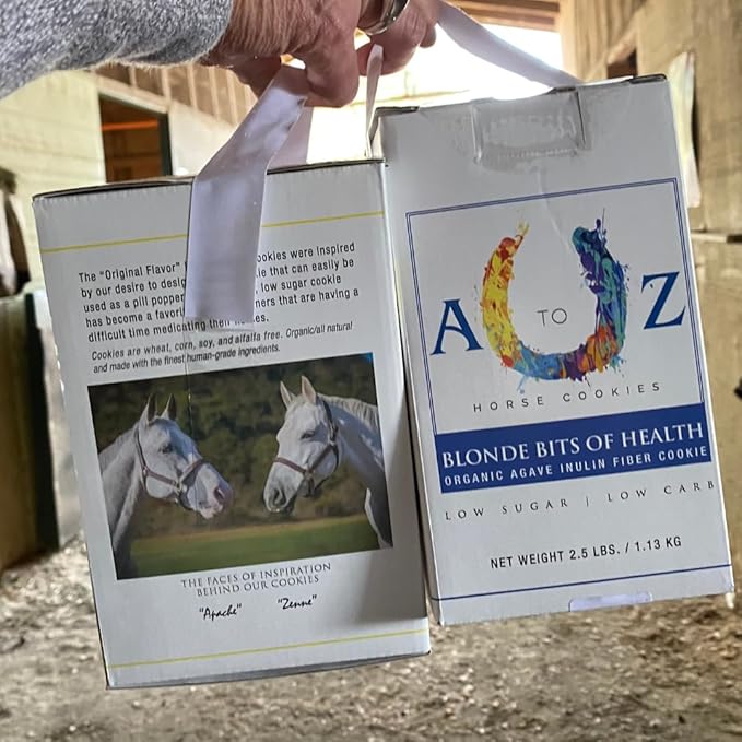 Horse treat boxes being held: Blonde Bits of Health organic agave fiber cookie